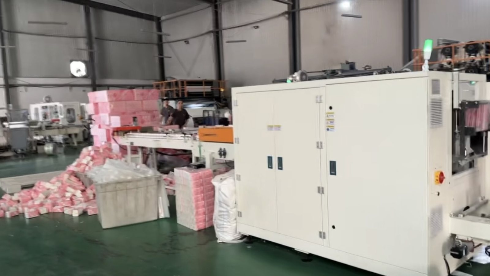 Toilet paper production line inside a manufacturing facility