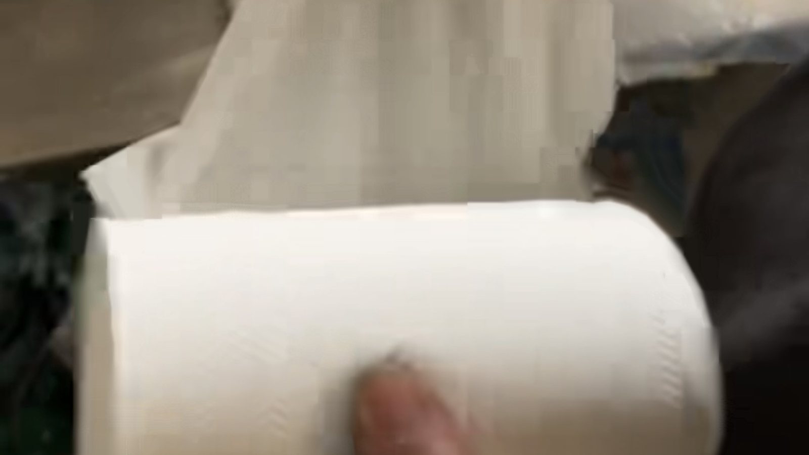 Quality inspector reviewing production documents